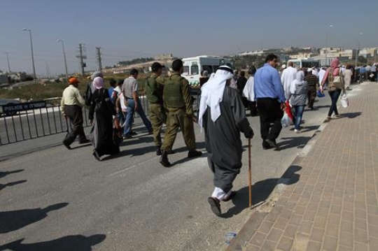 Palestinian existing in Israeli checkpoint