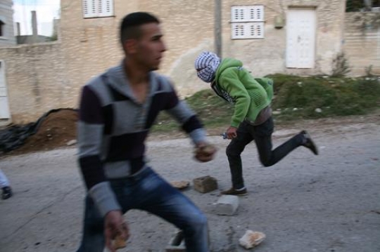 Palestinian youth fighting