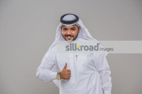 Middle Eastern Businessman giving the thumbs up