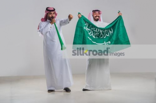 Middle Eastern men representing their country|