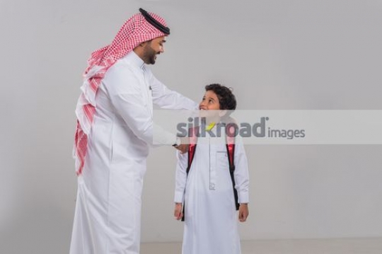 Middle Eastern father and son bonding|