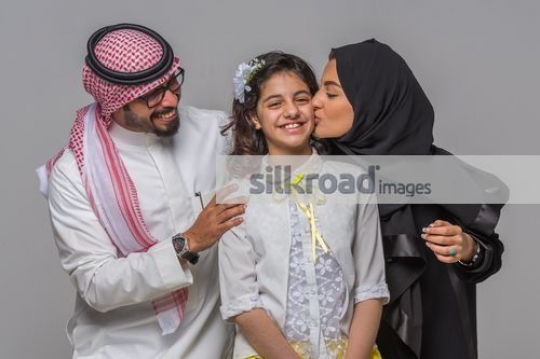 Arab family portrait with the young girl |