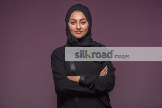 Woman standing arms crossed|