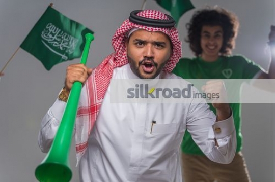 Middle Eastern men representing their country|