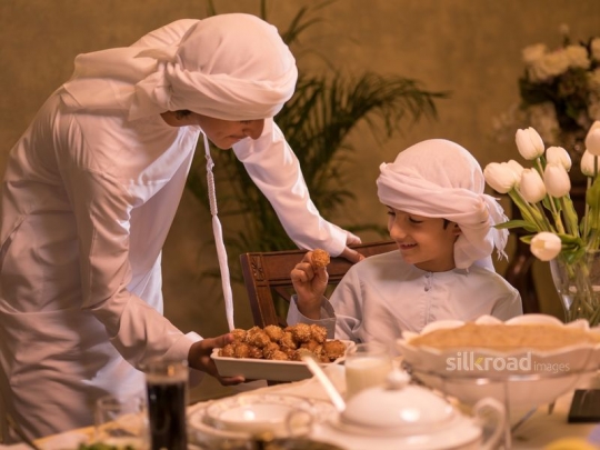 Brothers having sweets|-