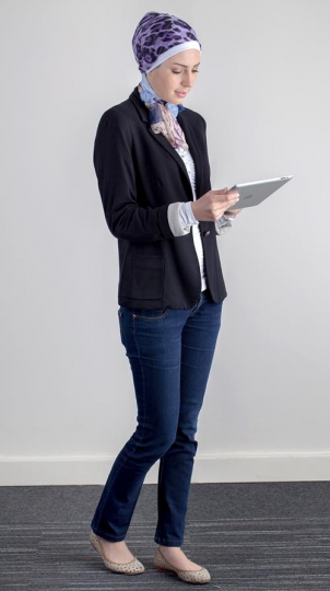 young woman holding ipad