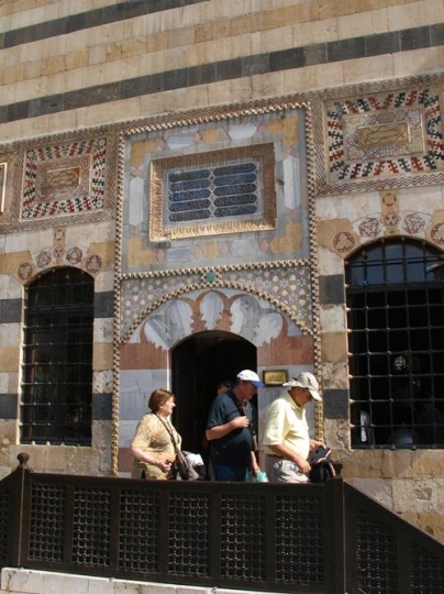 tourists in a mosque in syria