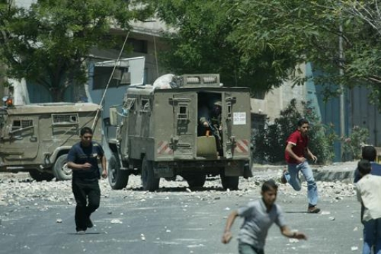 Palestinian youth fighting