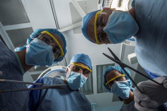 Surgeons Holding Scissors and 