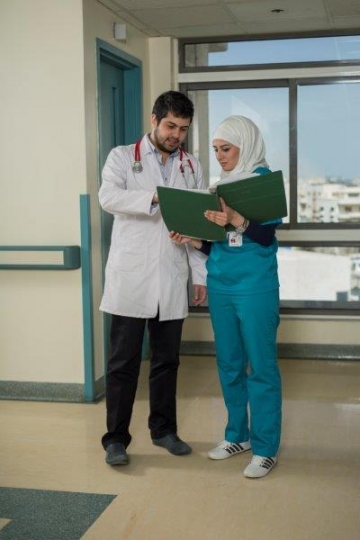 A Doctor and Nurse Discussing Medical Results