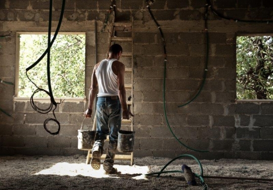 Palestinian Worker at Construction Site