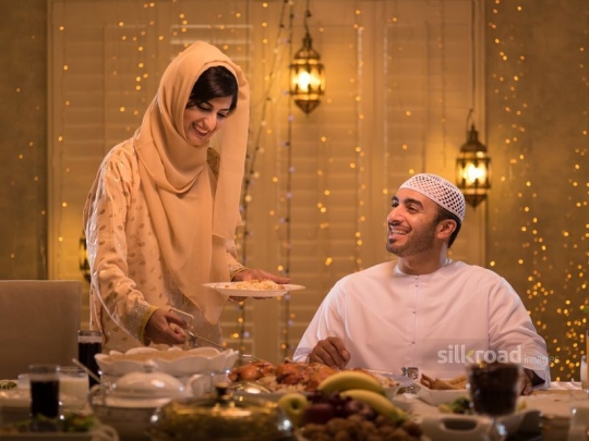 Wife serving husband|-