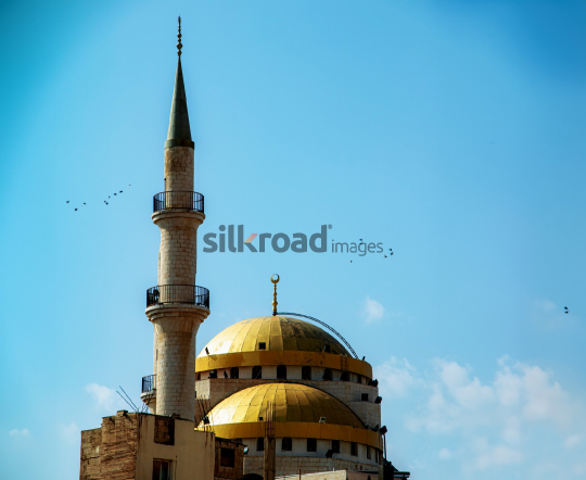 Golden Domes and Minaret of Mosque in Madaba, Jordan