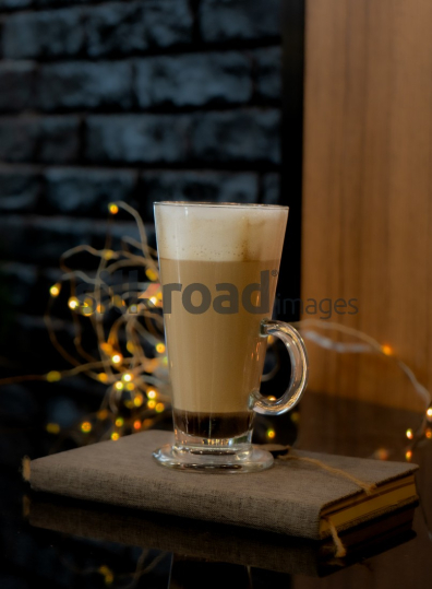 Latte Coffee with Bokeh Lights and Notebook