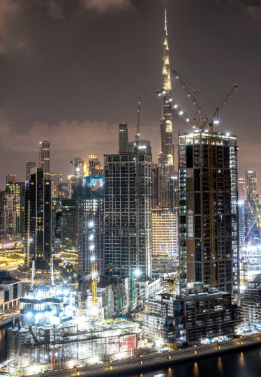 Nighttime Construction View with Burj Khalifa Tower in Dubai