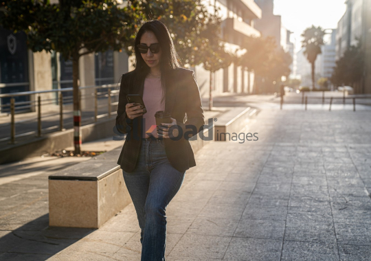 Professional Woman Enjoying Morning Coffee in Al Abdali Boulevard