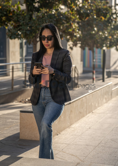 Professional Woman Enjoying Morning Coffee in Al Abdali Boulevard