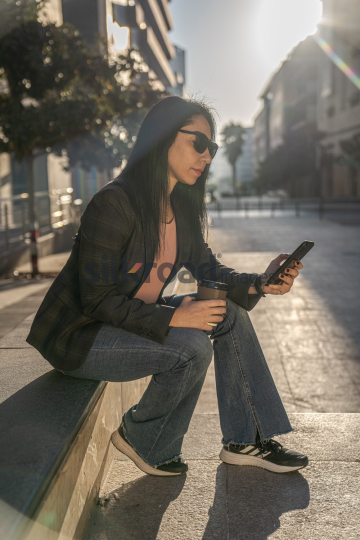 Professional Woman Enjoying Morning Coffee in Al Abdali Boulevard