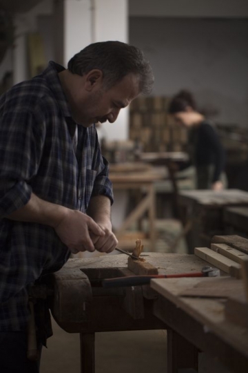 Man cutting the wood