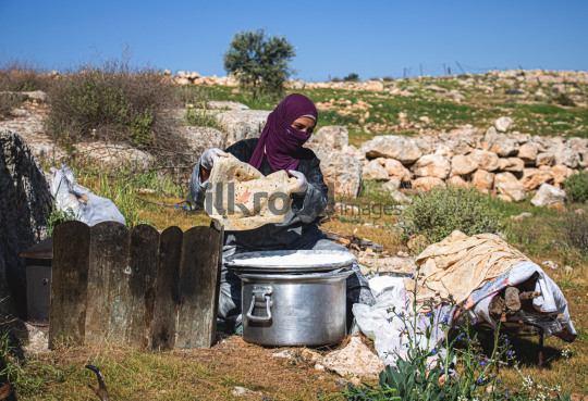 Rural Woman Making Traditional Bread Outdoors - Flatbread Preparation