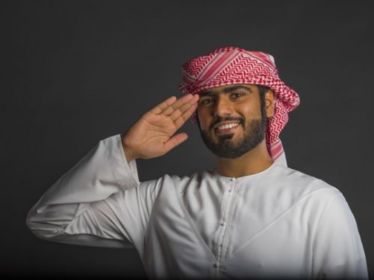 Portrait of a man saluting |