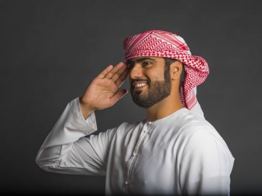 Middle Eastern man saluting 