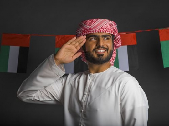 Middle Eastern man celebrating his country