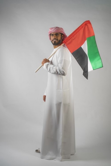 Middle Eastern man celebrating the UAE National day
