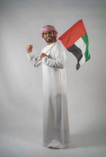 Proud Middle Eastern man celebrating the UAE National Day