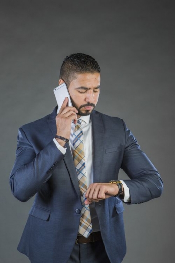 Arab Businessman on the phone|-