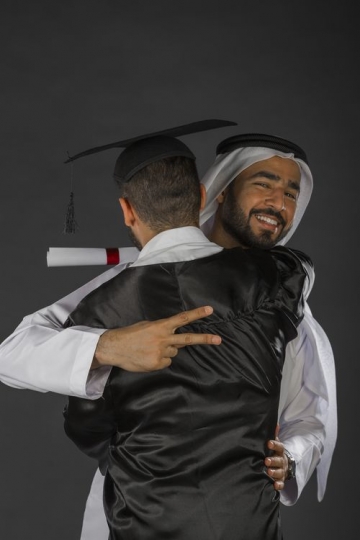 A Cool Arab Dad Greeting Son on Graduation|-