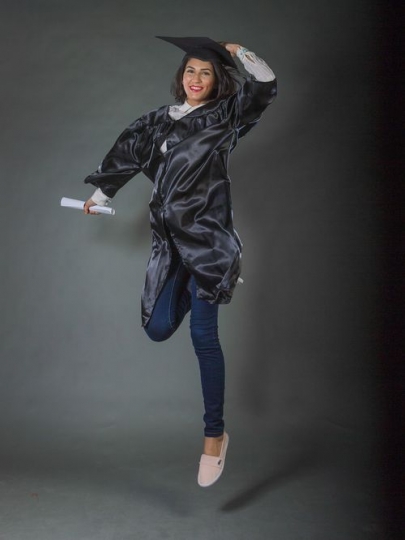 Arab woman jumping with excitement 