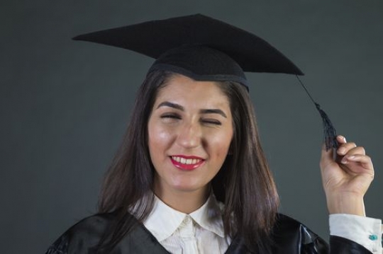 A Young Arab Woman Graduated|-