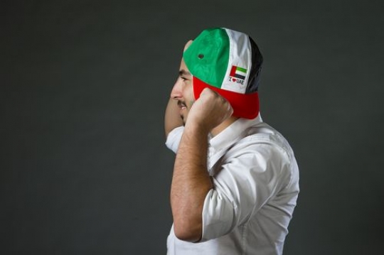 Man representing the UAE National Day 