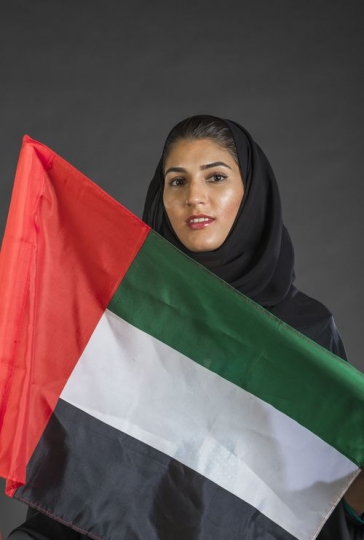 Middle Eastern woman celebrating the UAE National Day