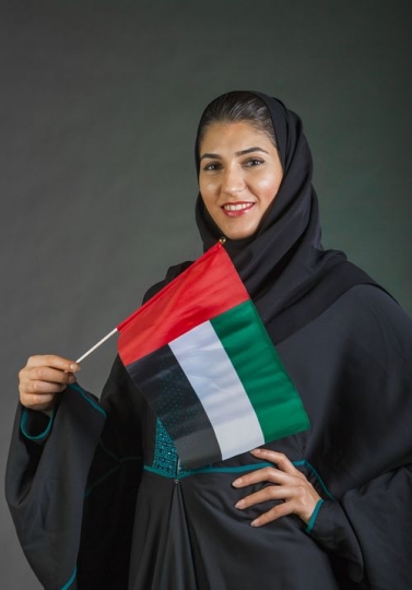 Middle Eastern woman celebrating the UAE National Day
