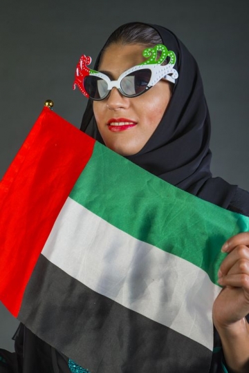 A Close up of a Woman with the UAE Flag