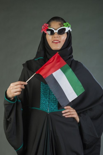 Woman celebrating National Day for the UAE
