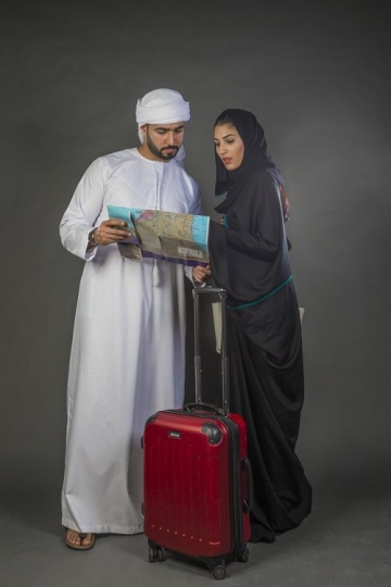 Arab couple on holiday together|-