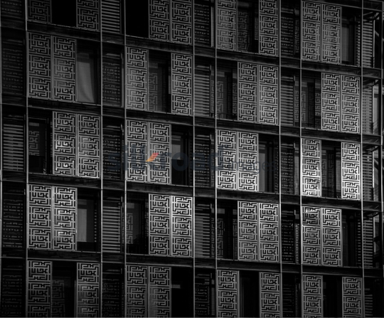 Stunning View of Al Abdali Boulevard with Sunlit Glass Building Wall