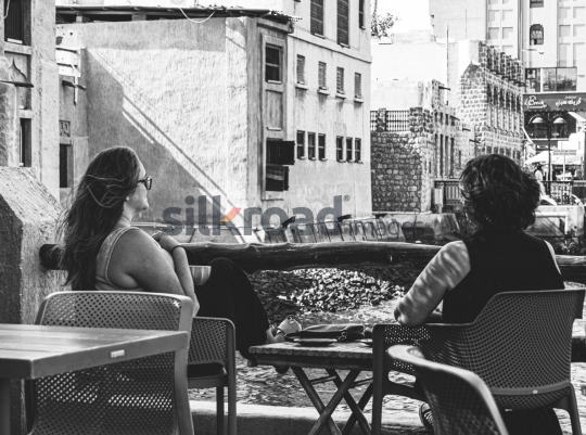 Two Women Enjoying Scenic View at a Dubai Restaurant